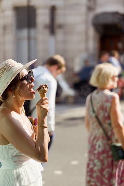 Quite happy catching this lady. I was about to cross the road as I saw her eating the ice cream. I think I caught her in a perfect moment. <hr>Summer London Walk 2026
